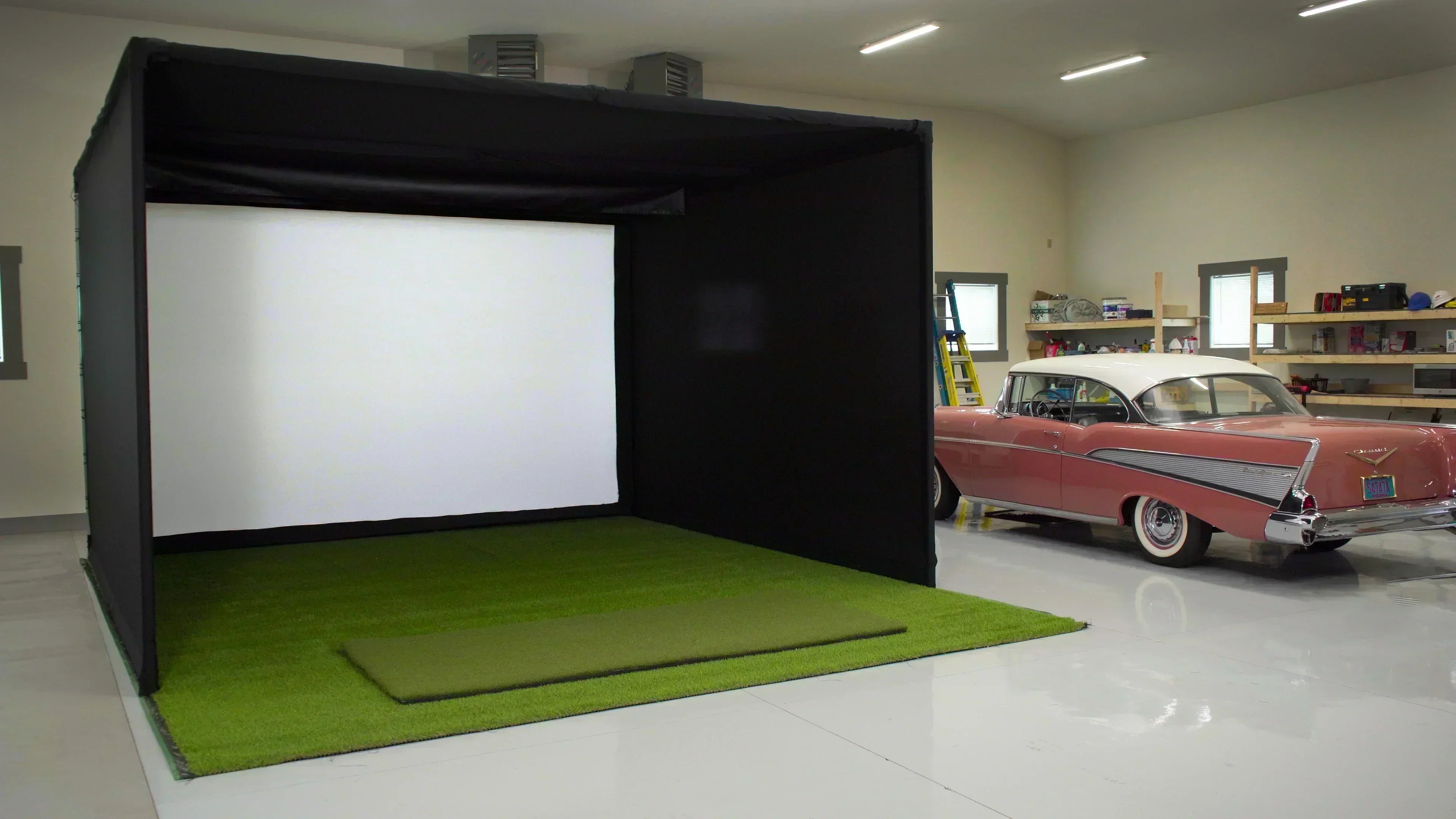 golf simulators for garage indoor shot next to car