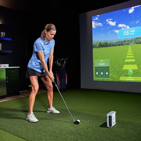 top rated golf simulators girl hitting view