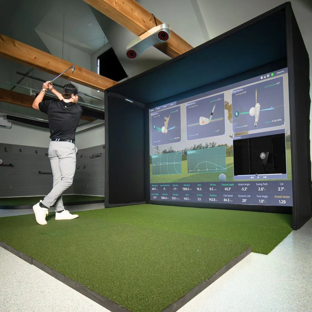 best virtual golf simulator man hitting action shot